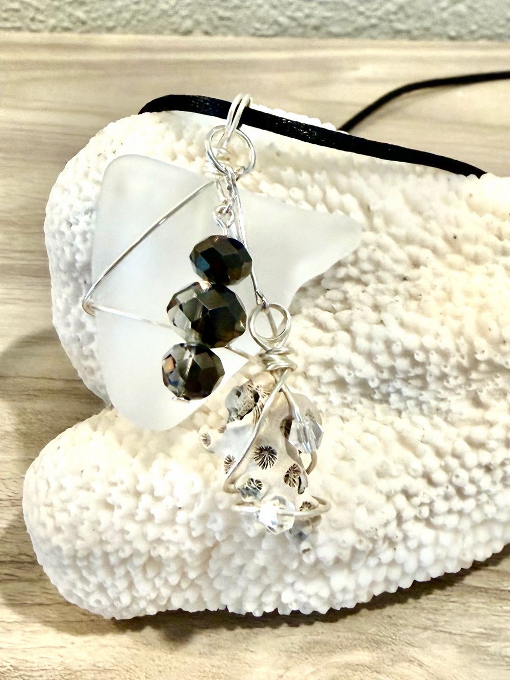 94. Beach Glass Pendant Necklace with Iridescent Black Beads and coral